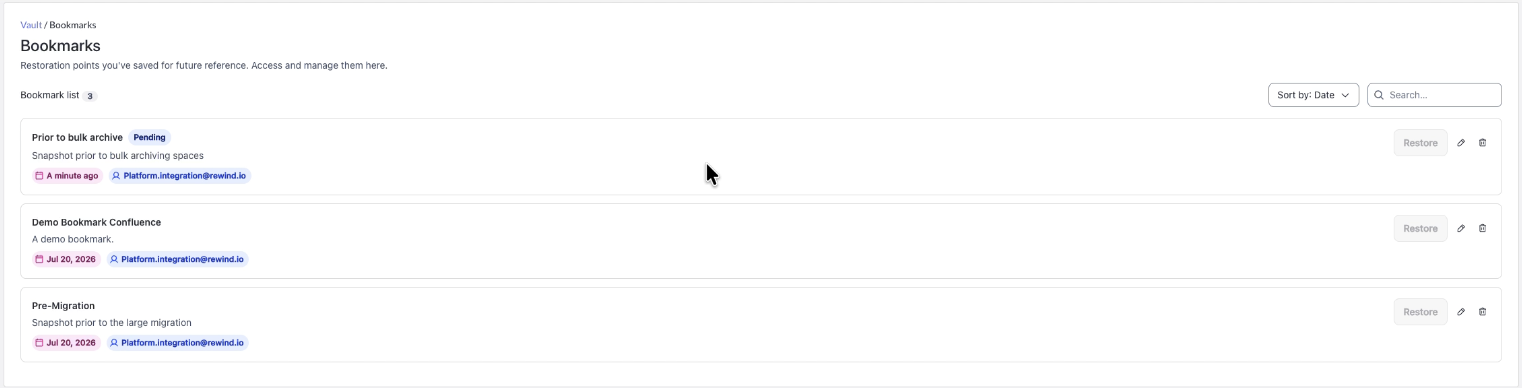 The Bookmarks page listing three bookmarks with their descriptions, creation dates, and creators. The top bookmark shows a Pending status and its Restore button is unavailable