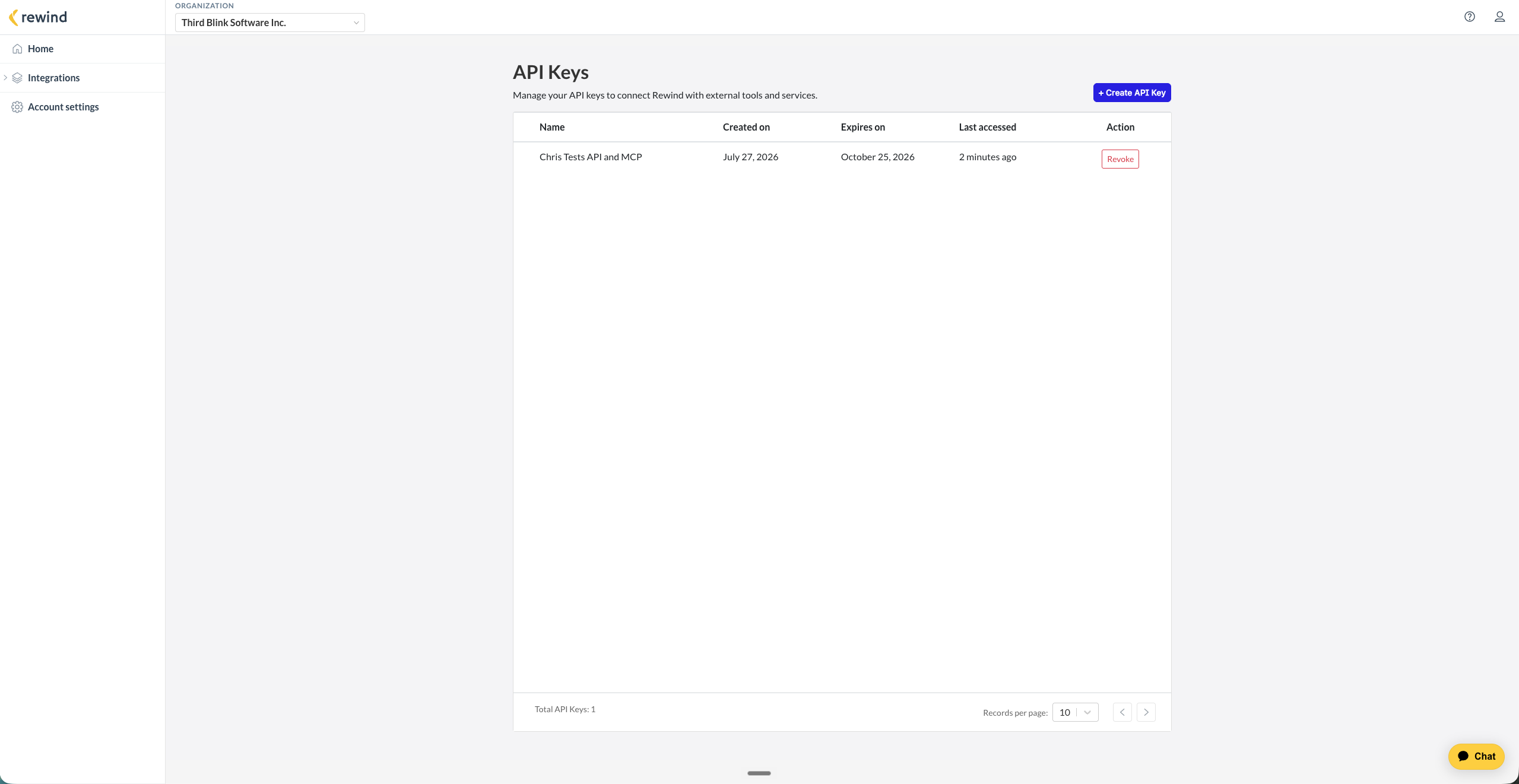 The API Keys page listing a key with its name, creation date, expiry date, and last accessed time, alongside a Revoke button